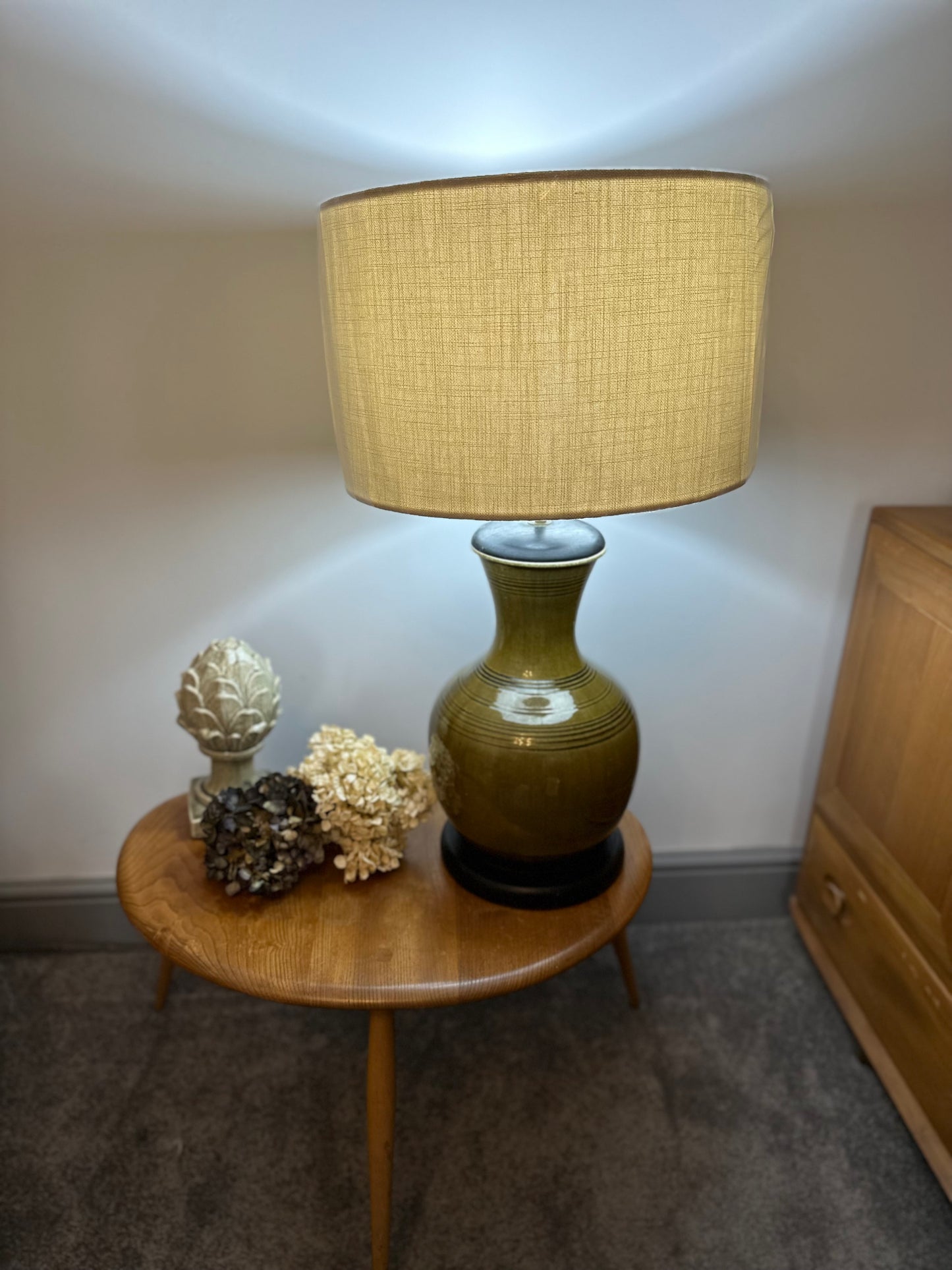 Large olive green antique lamp in the form of a ginger jar