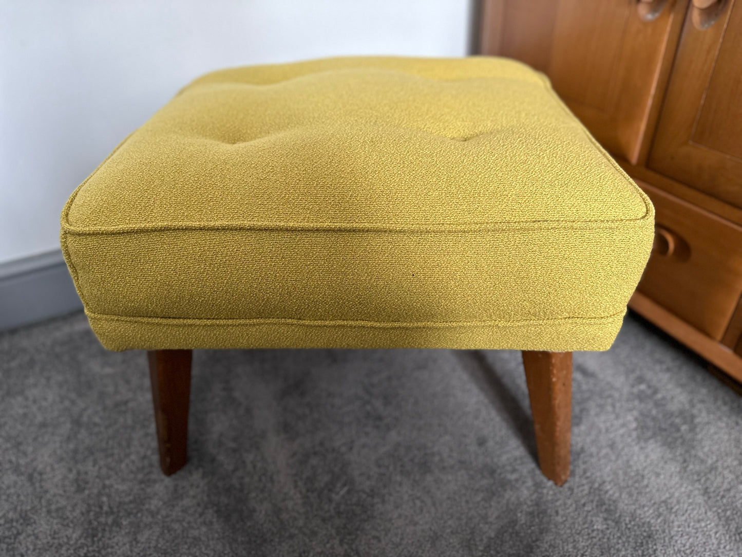 Mid Century G Plan Reupholstered sprung footstool in Bute mustard Boucle