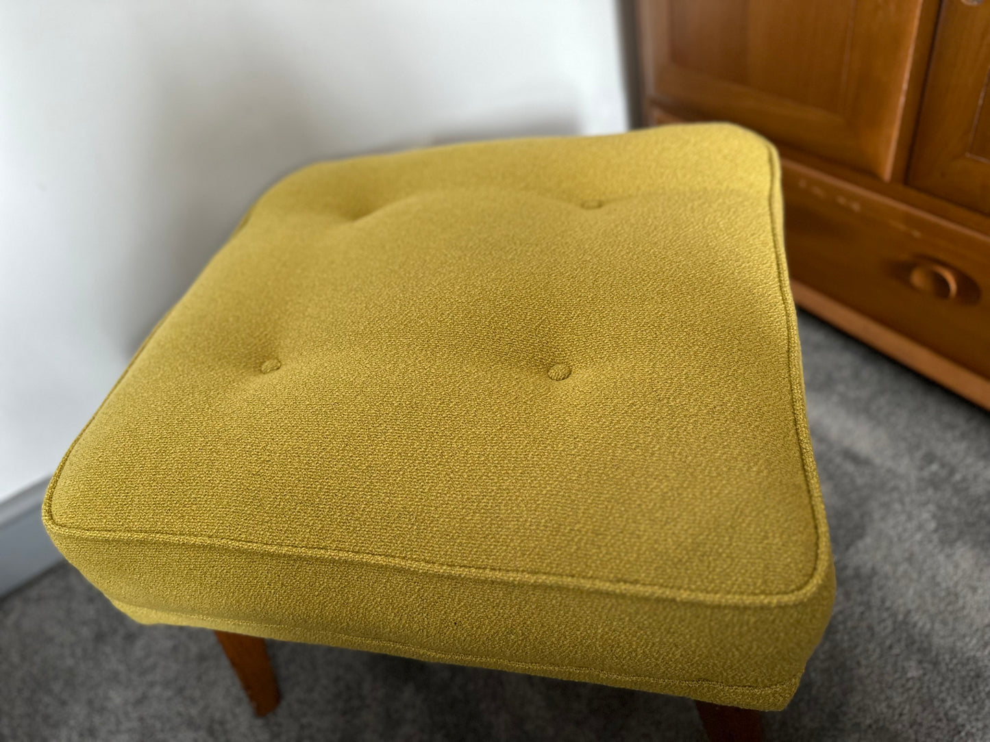 Mid Century G Plan Reupholstered sprung footstool in Bute mustard Boucle